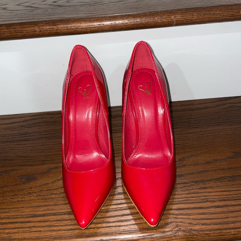 Elegant pointy red shoes